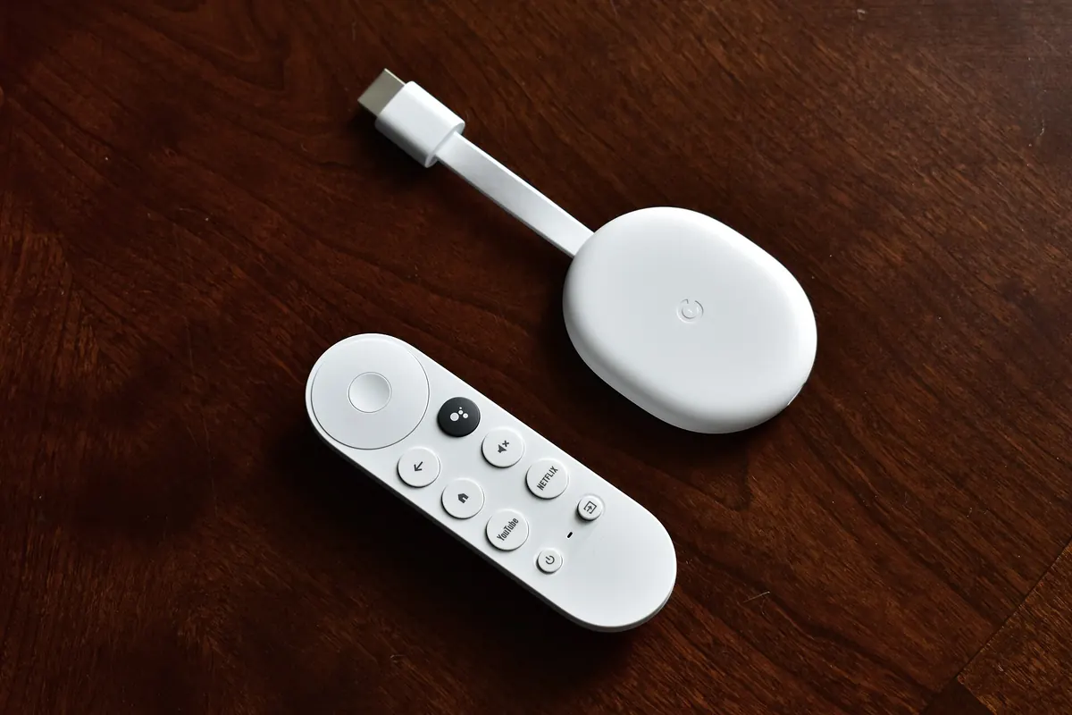 A Chromecast with Google TV and its remote