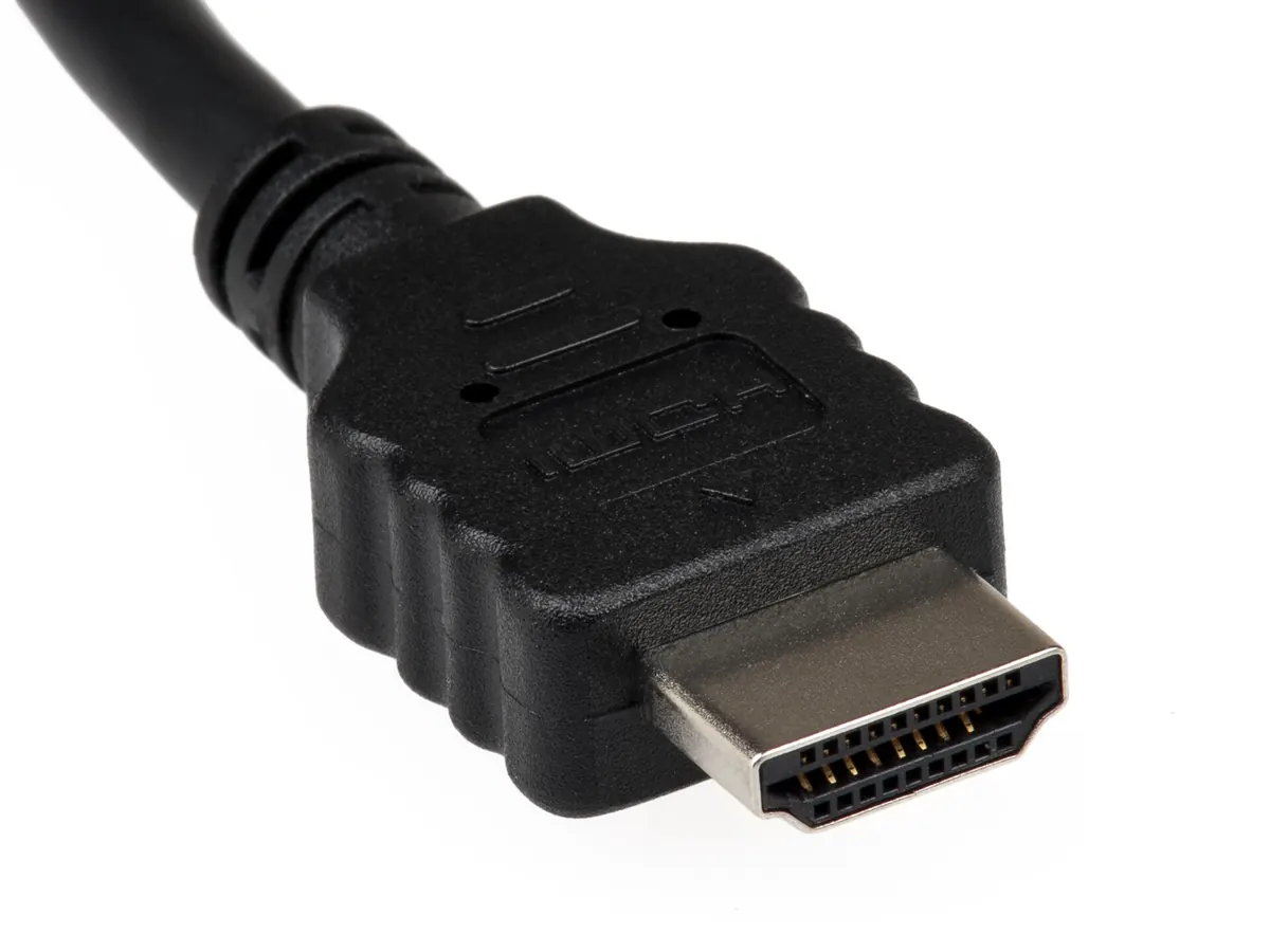 HDMI cables connected to equipment in a home media setup
